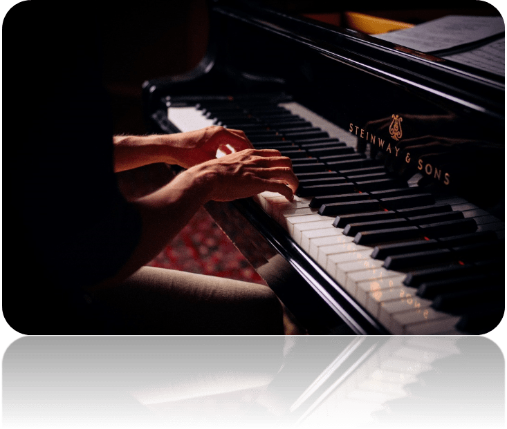 Une image contenant musique, piano, instrument de musique, clavier

Description générée automatiquement